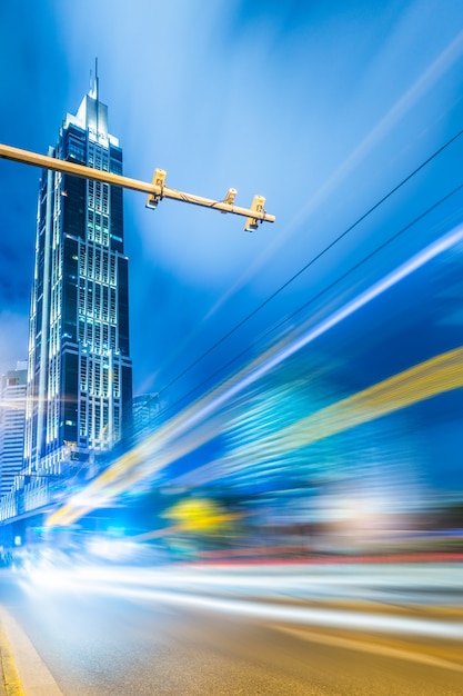 blurred traffic light trails on road