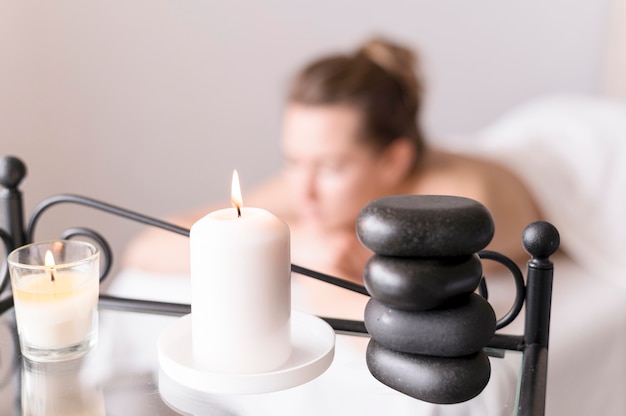 Free photo blurred woman on massage table