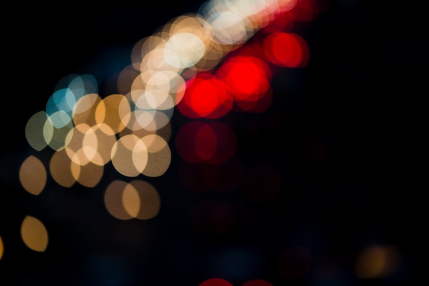 Free photo blurry lights background in different colors