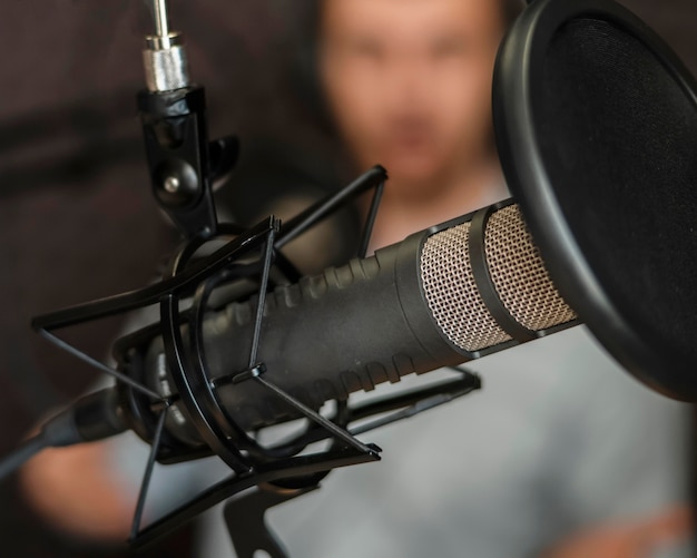 Blurry man with radio equipment close-up