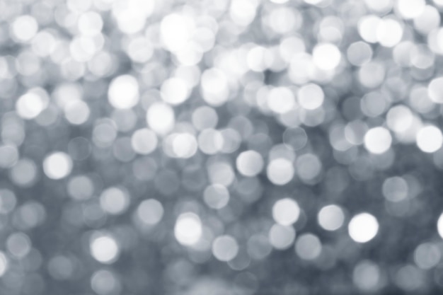 Free photo blurry shiny silver glitter textured