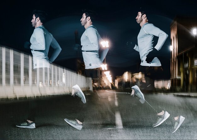 Blurry silhouette of man running on street