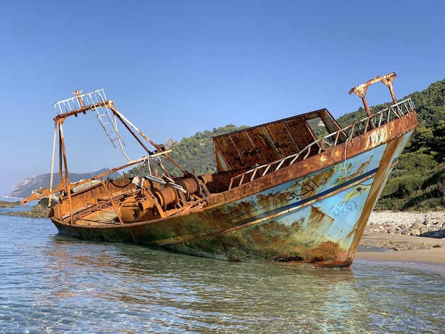 Boat on the beach at daytime