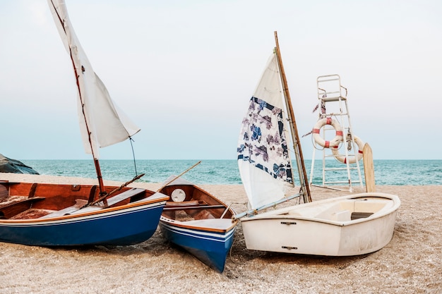 Free photo boats on a beach