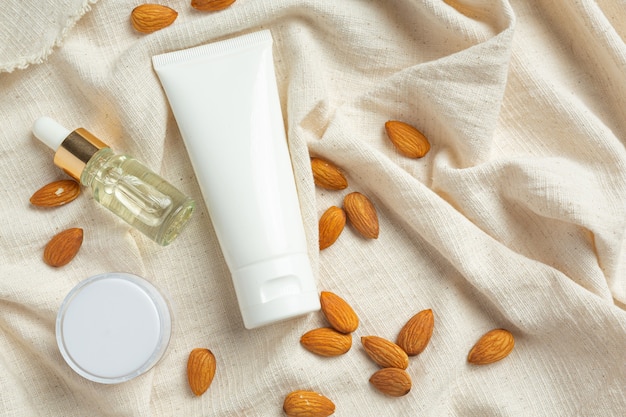 Free photo body almond moisturizer on white background