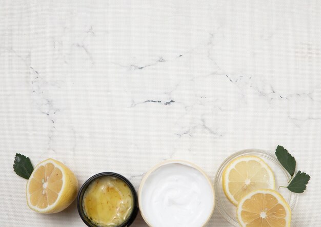 Body care products arrangement on marble background