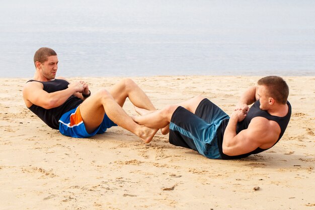 Bodybuilders on the beach