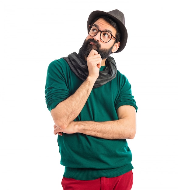 Bohemian man thinking over white background