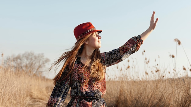 Free photo bohemian woman basking in the sun