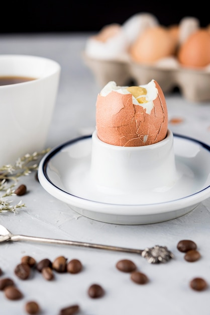 Boiled egg and coffee beans