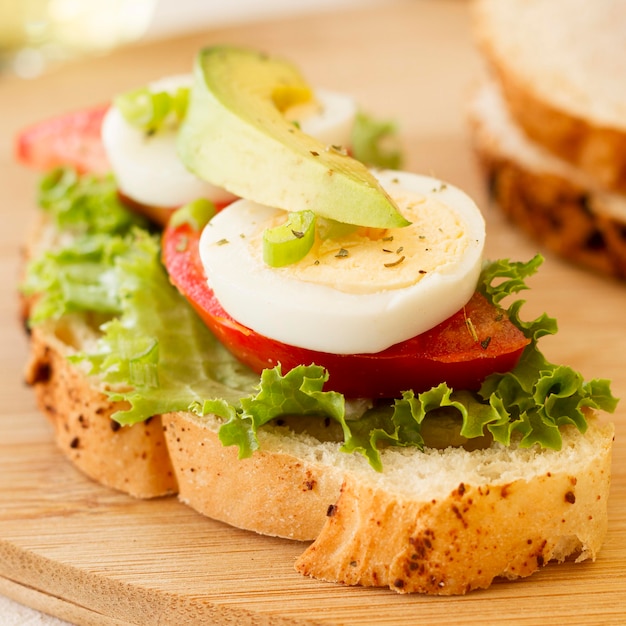 Boiled egg and tomatoes sandwich