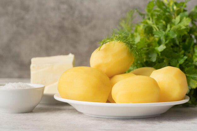 Boiled potatoes in white plate