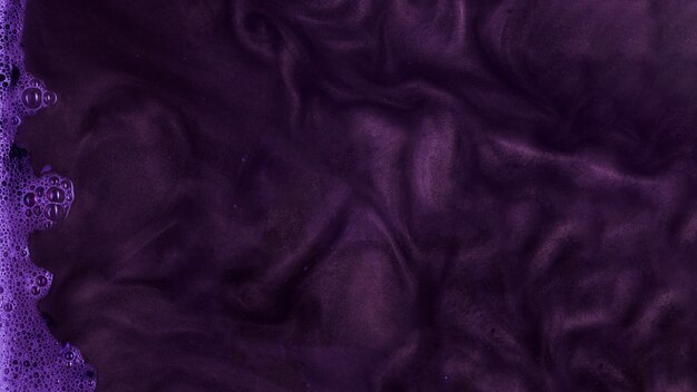 Boiling purple stiff paint with foam 