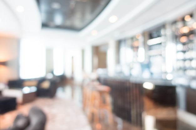 Bokeh background of restaurant with wooden chairs