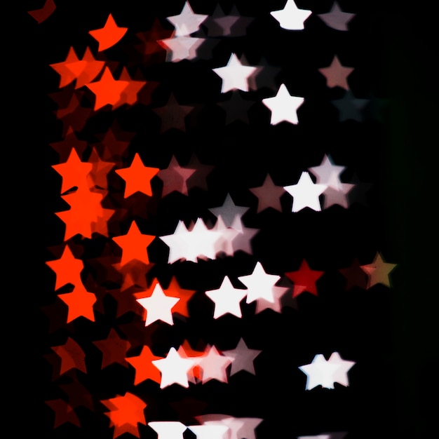 Bokeh background with red and white lights in star shape