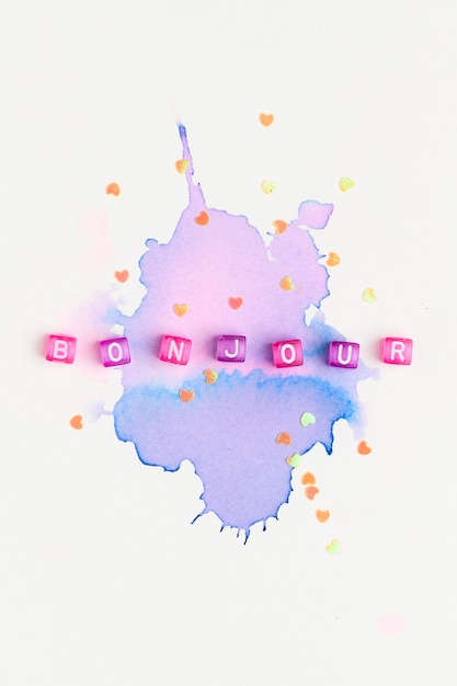 Free photo bonjour beads text typography on purple