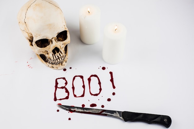 Boo word and skull with candles 