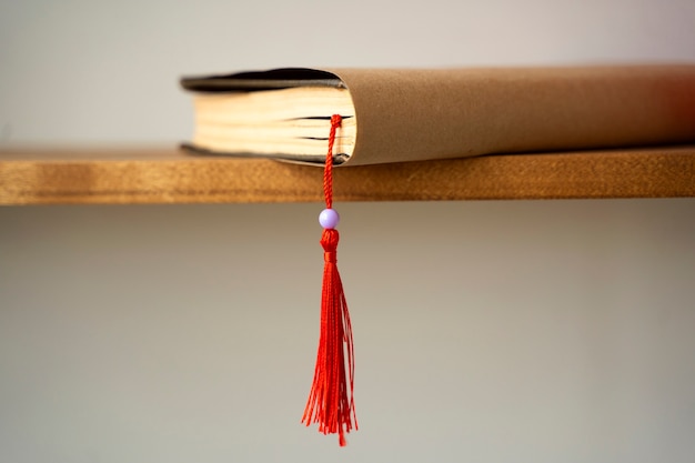 Book on shelf with bookmark