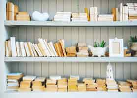 Free photo book shelf with stack of no cover books