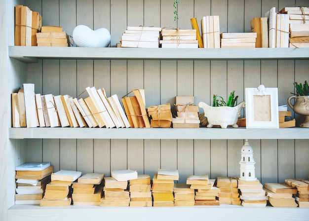 Book Shelf with Stack of No Cover Books