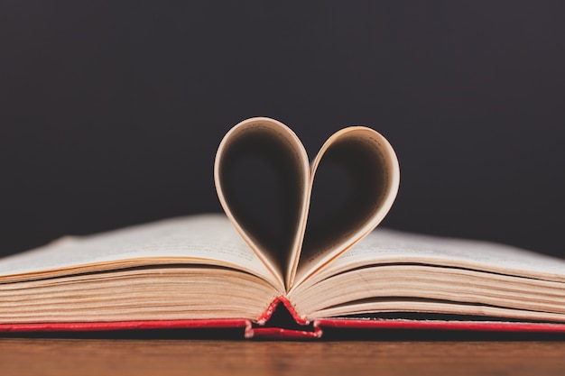 Book with folded heart-shaped leaves