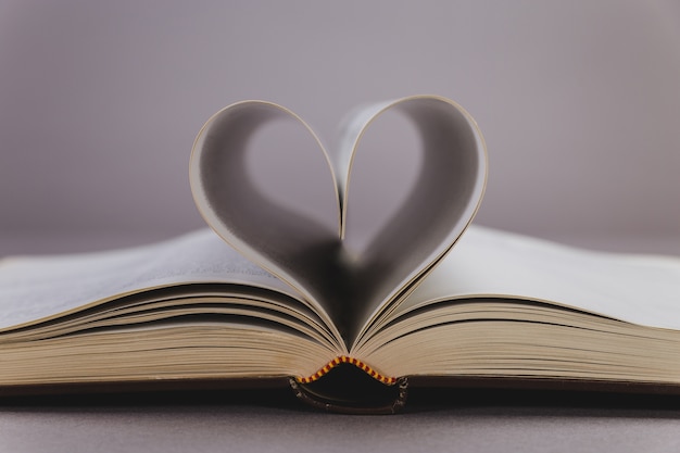 Book with pages placed in heart shape