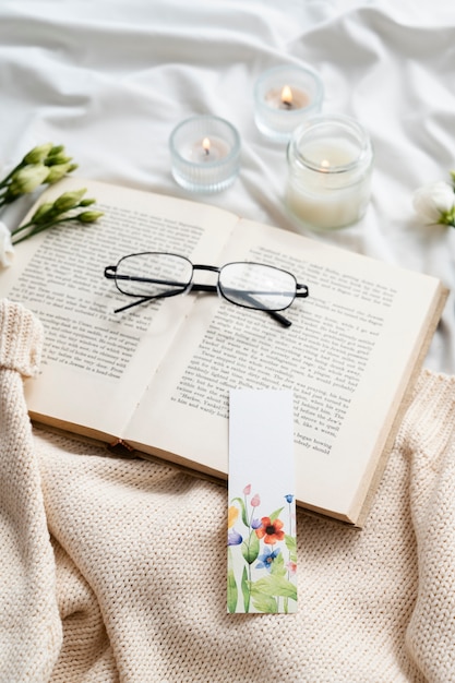 Free photo bookmark on book arrangement high angle