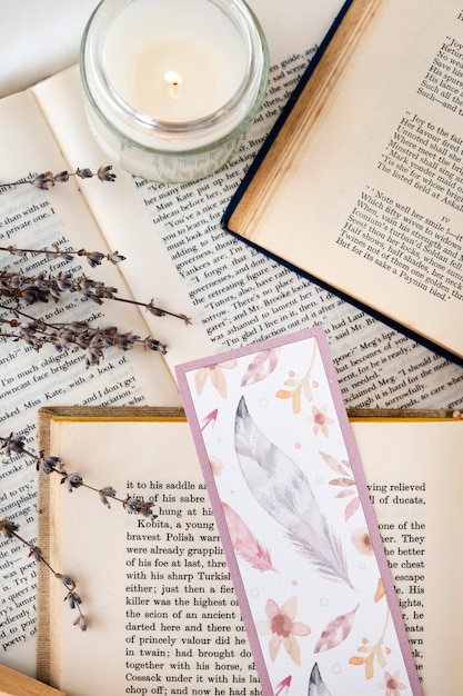 Free photo bookmark and books assortment above view