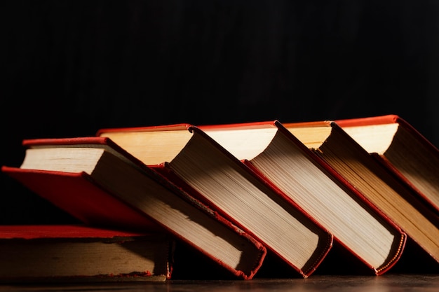 Books arrangement with dark background