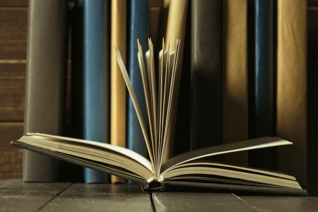 Books close up on old wooden table