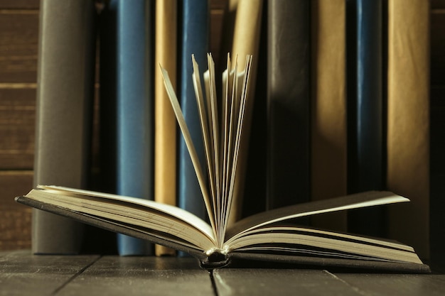 Books close up on old wooden table