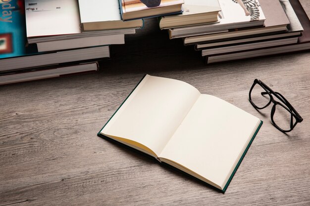 Books forming bridge and glasses