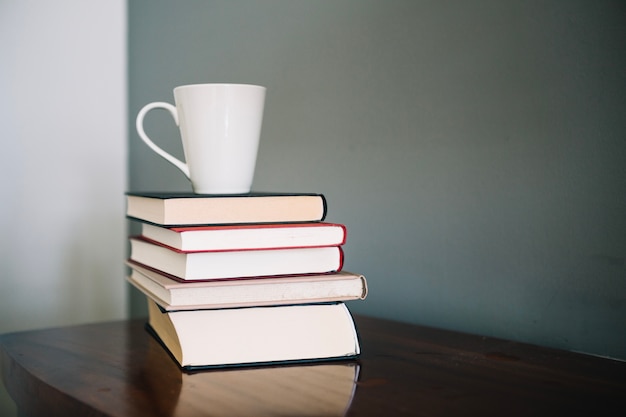 Books and white cup