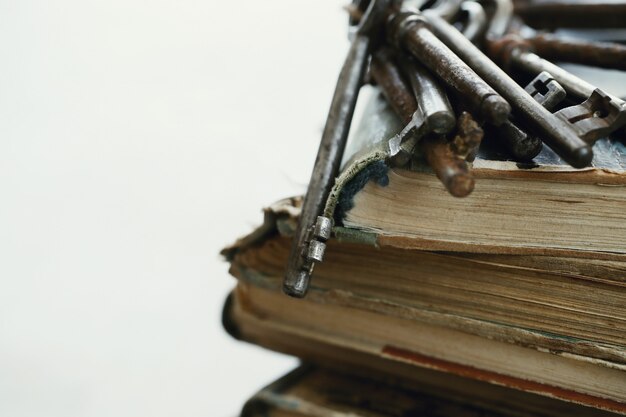 Books with old rusty keys