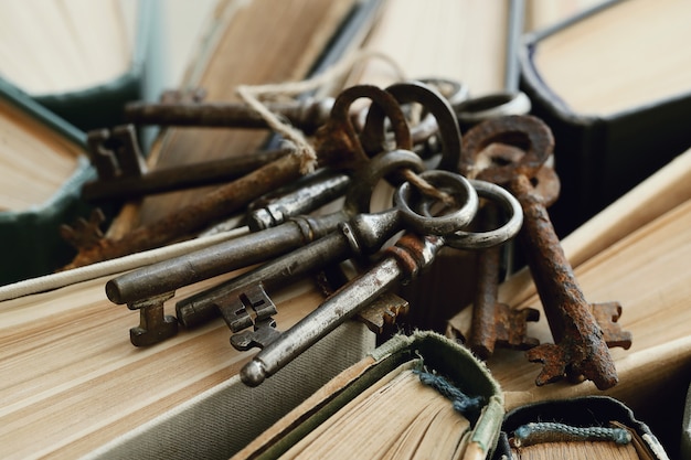 Books with old rusty keys