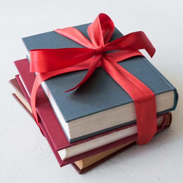 Books with red ribbon 