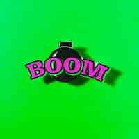 Free photo boom text on bomb over the green backdrop