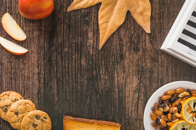 Border from snacks and autumn leaf