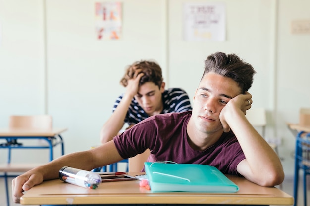 Bored and sad classmates