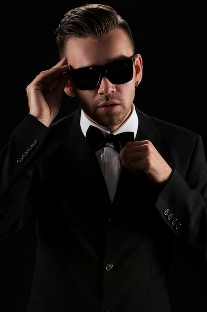 Boss, gentleman. Attractive businessman in black suit