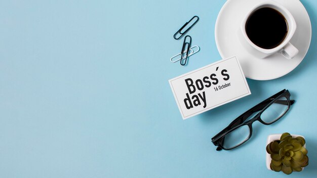 Boss's day assortment on blue background with copy space