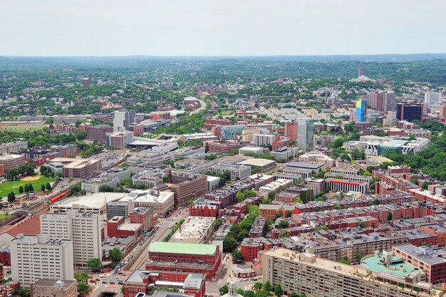 Boston city aerial view with urban buildings and highway.