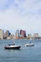 Free photo boston downtown skyline with boat