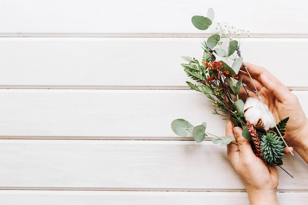 Botanical composition with hands