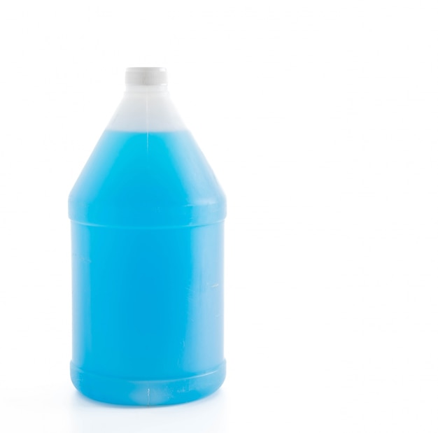 Bottle of blue cleaning detergent