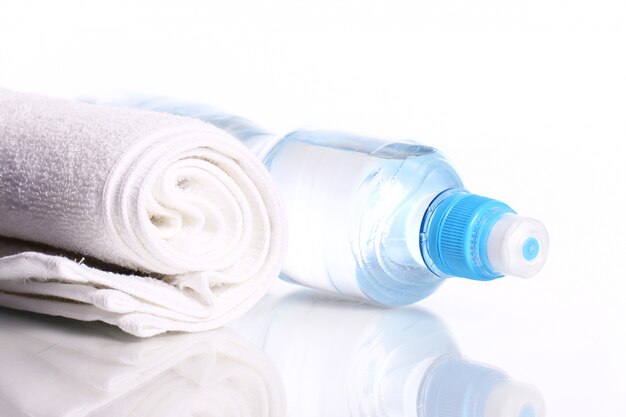 Bottle of fresh water and towel