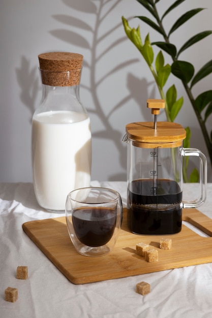 Free photo bottle of milk with coffee