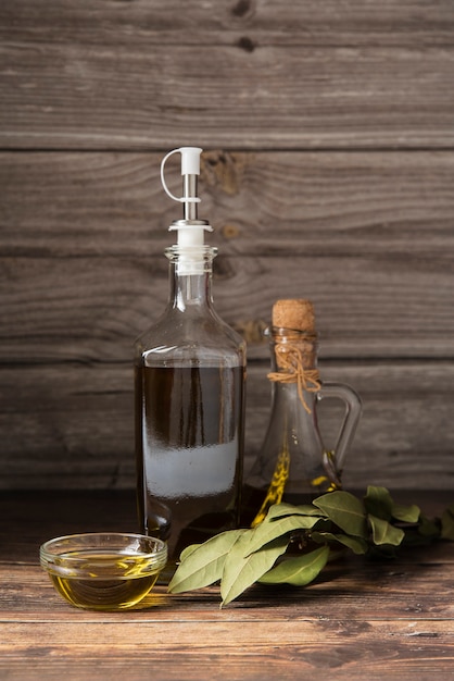 Free photo bottle of organic olive oil on the table