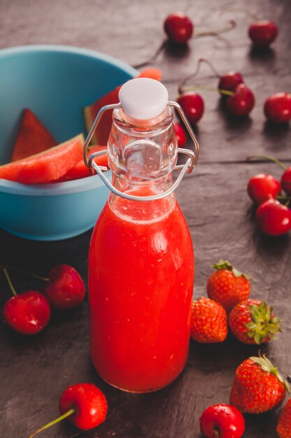 Bottle of red fruits juice