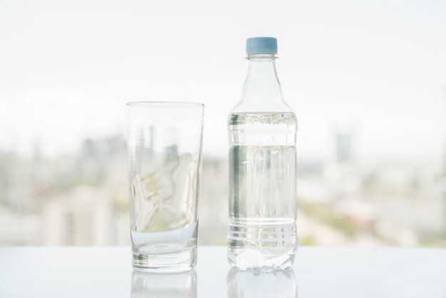 Bottle of water with glass